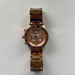 Nixon watch. Rose gold